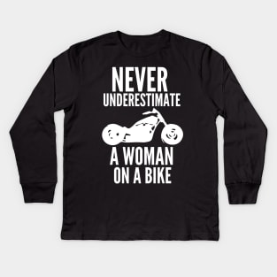 Never underestimate a woman Kids Long Sleeve T-Shirt